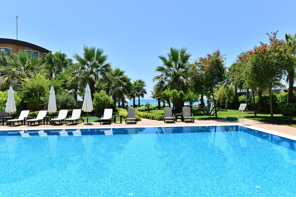Indoor pool, outdoor pool, open 8:00 AM to 9:00 PM, pool umbrellas