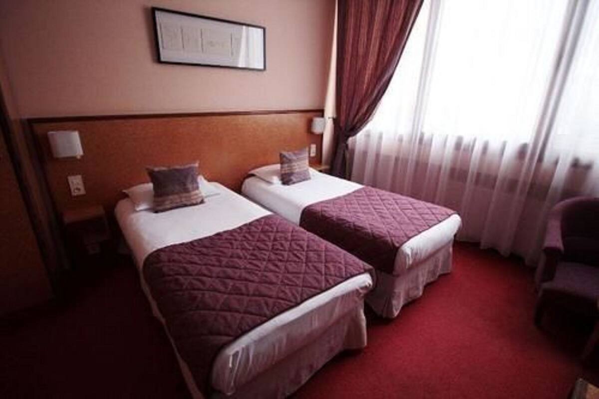 Luxe beddengoed, bedden met traagschuimmatrassen, een minibar
