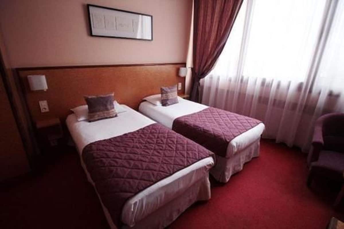 Luxe beddengoed, bedden met traagschuimmatras, een minibar
