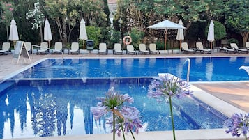 Outdoor pool, pool umbrellas, pool loungers