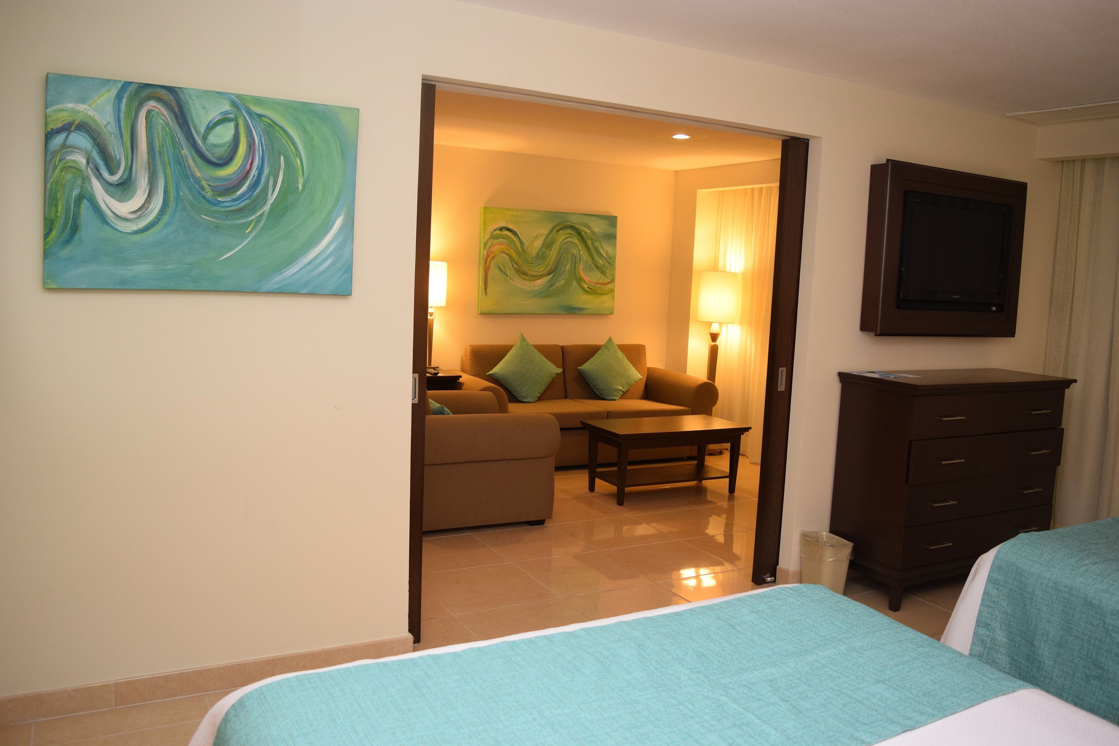 suite, 2 queen beds, sea view | in-room safe, desk, soundproofing, iron/ironing board
