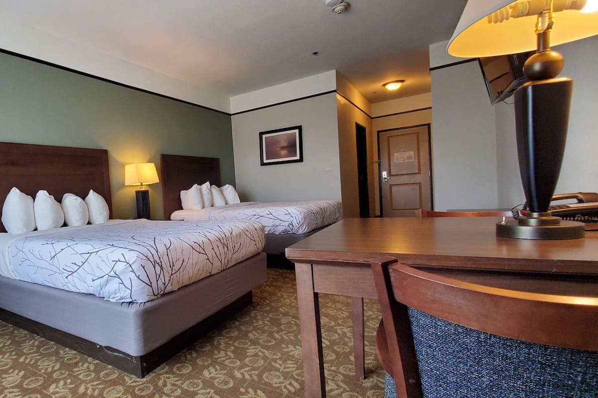 Pillowtop beds, desk, laptop workspace, blackout drapes