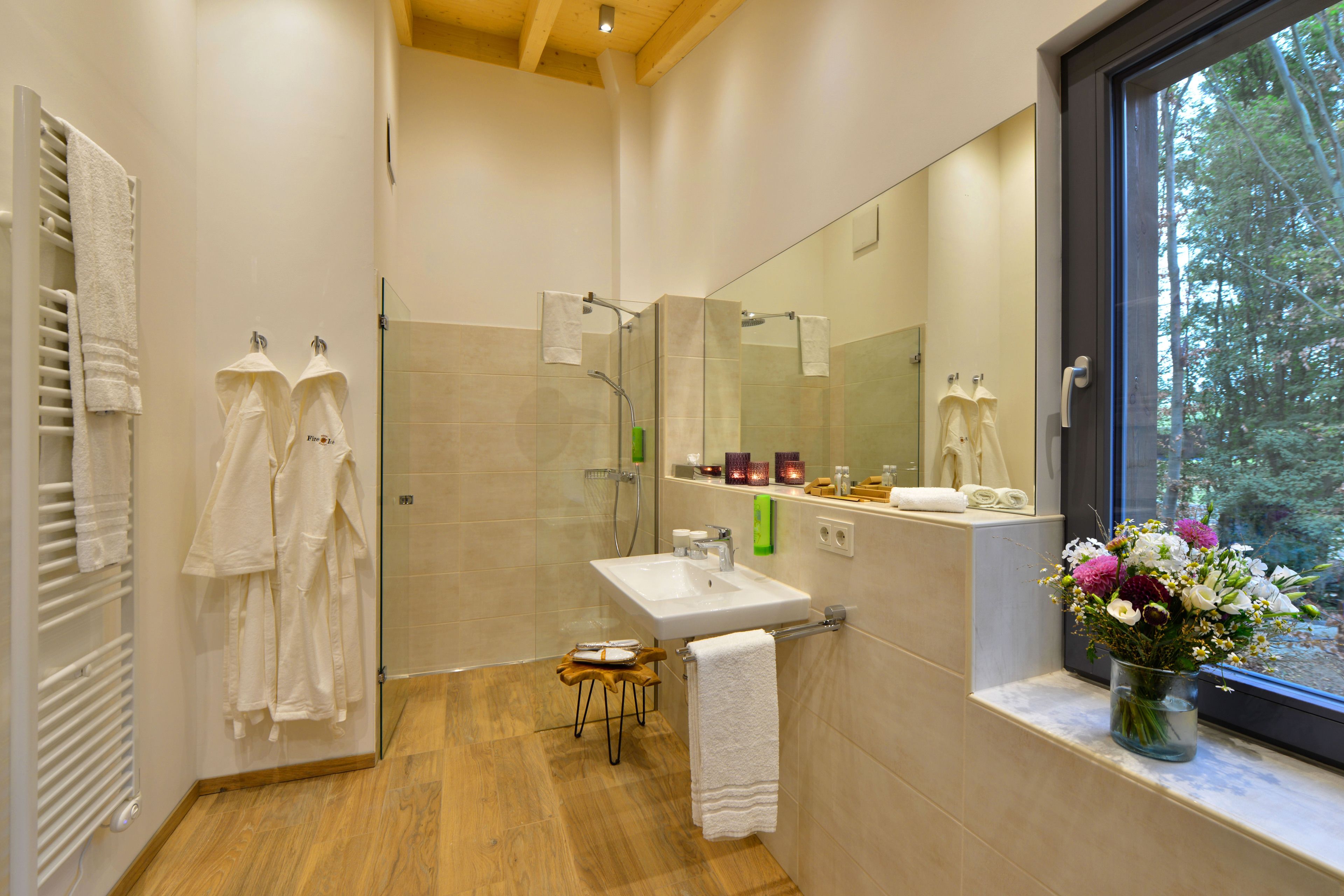 baum chalet, 1 queen bed, garden view | bathroom | shower, free toiletries, hair dryer, bathrobes