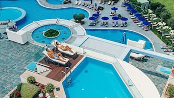 Indoor pool, outdoor pool, pool umbrellas, sun loungers