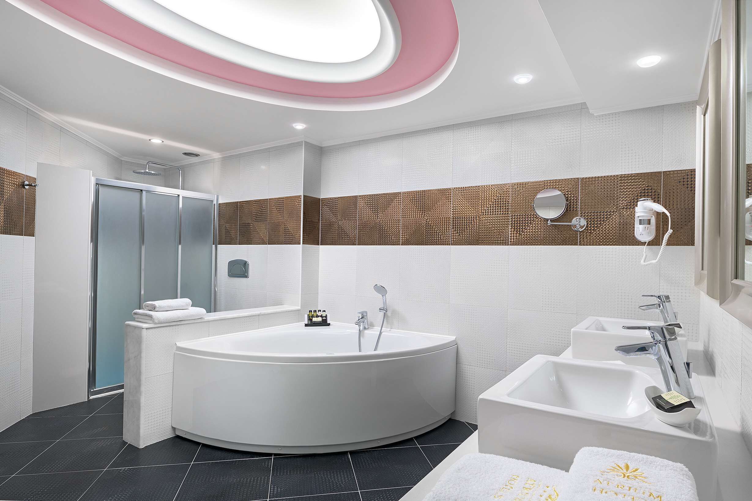combined shower/bathtub, jetted bath, designer toiletries, hair dryer