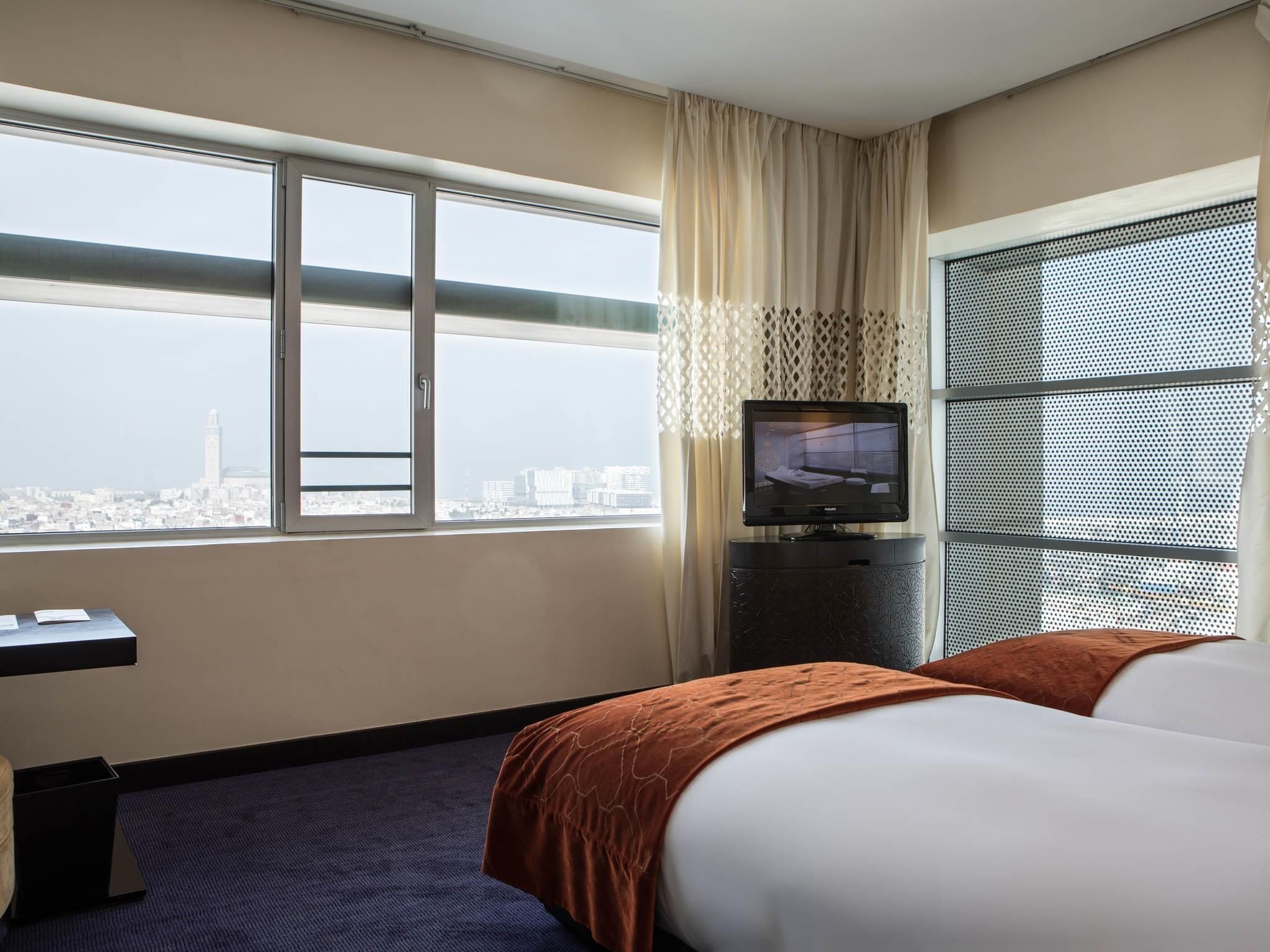 Habitación de lujo, 2 camas individuales (Medina View) | Ropa de cama de alta calidad y minibar 