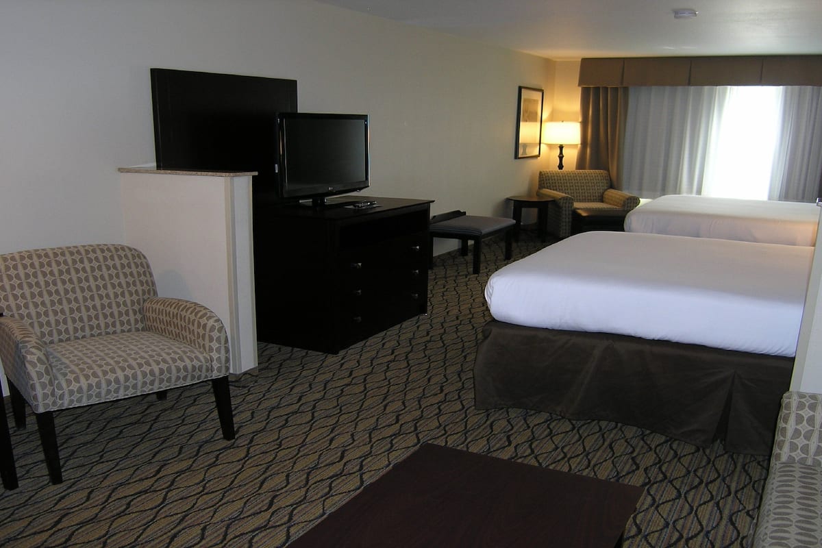 In-room safe, desk, iron/ironing board, cribs (free)