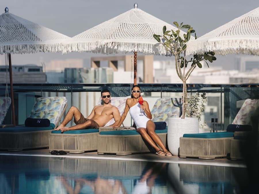 Outdoor pool, pool umbrellas, pool loungers