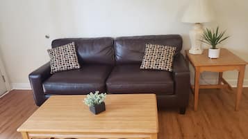 Suite, 2 Full Beds | Living area | Flat-screen TV