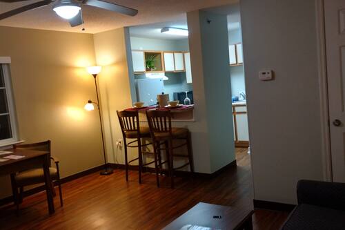 Suite, 1 King Bed, Kitchen | Living area | Flat-screen TV