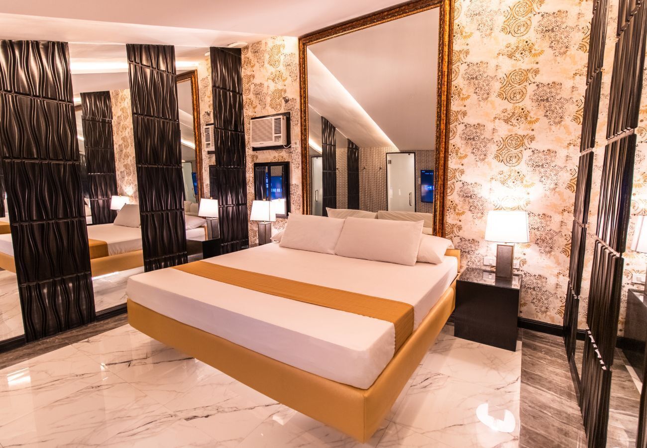 Suite, 1 Queen Bed | Minibar, individually decorated, individually furnished, desk