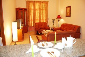 Deluxe Suite, Kitchen | Living room | LCD TV - Le Park Hotel (Doha)