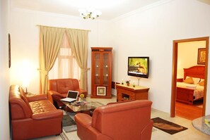 Deluxe-sviitti | Olohuone | LCD-televisio