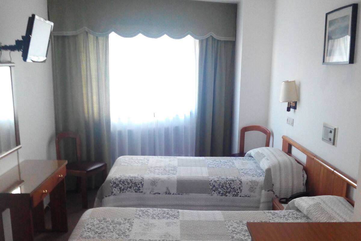 Triple Room | Desk, iron/ironing board, rollaway beds, free WiFi