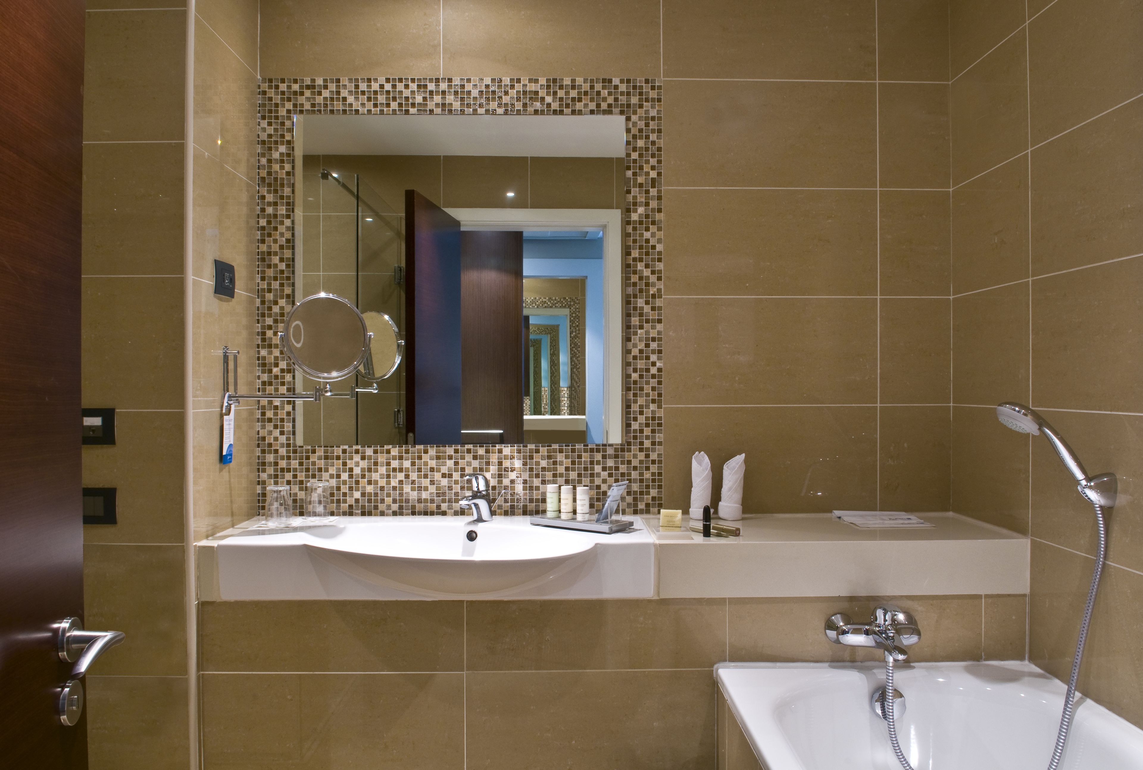 separate bathtub and shower, deep-soaking bathtub, designer toiletries