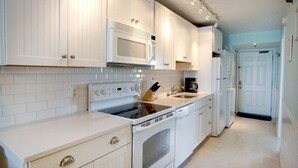 Condo, 2 Bedrooms, Ocean View | Private kitchen | Coffee/tea maker, fridge, oven, stovetop