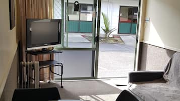 Suite, 1 Bedroom (Motel) | Cots/infant beds, WiFi, bed sheets