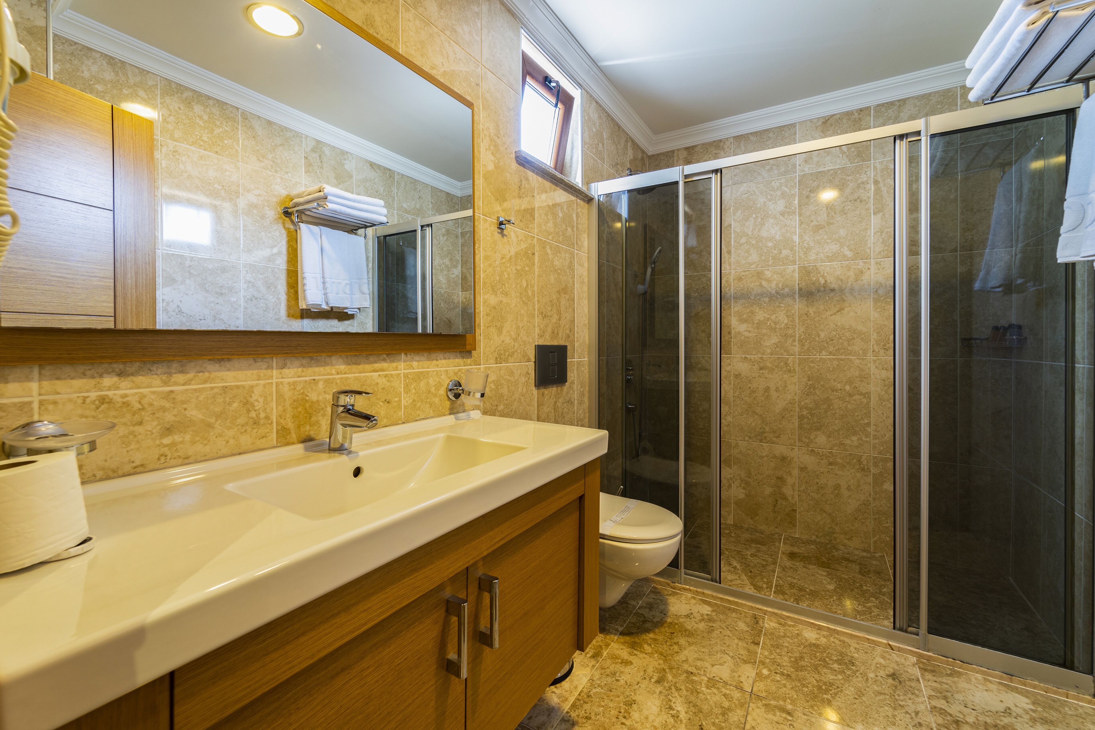 family room | bathroom | shower, hair dryer, slippers, towels