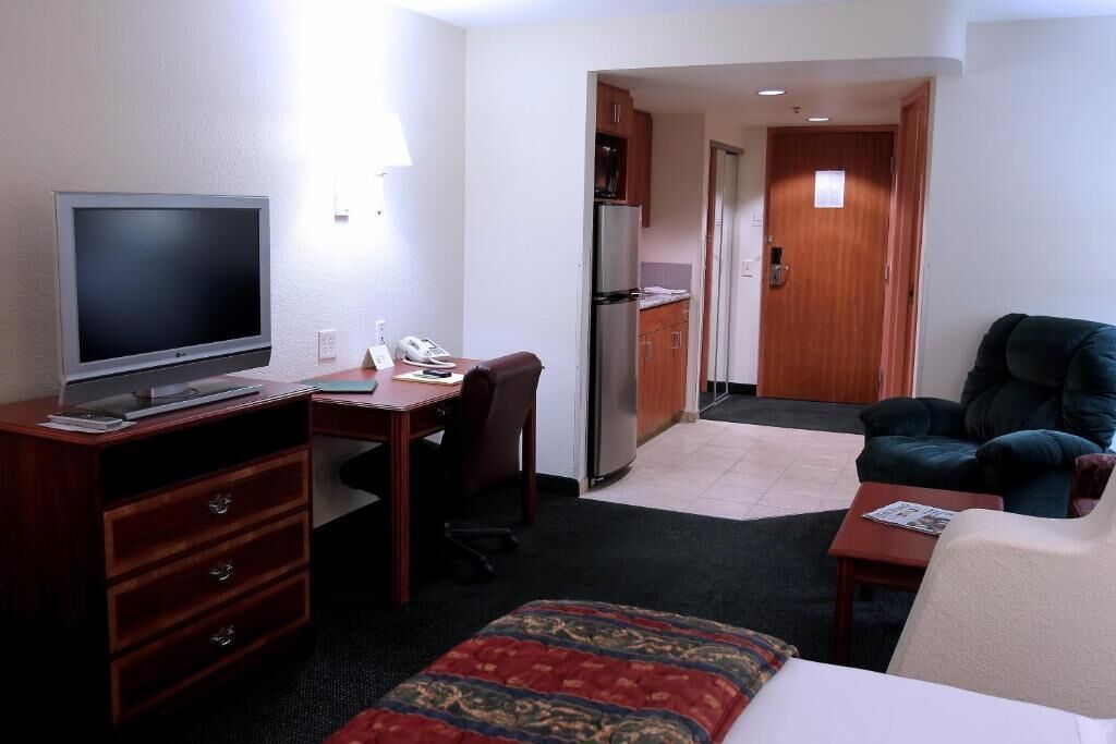 in-room safe, desk, blackout curtains, iron/ironing board