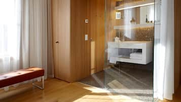 Separate tub and shower, hair dryer, slippers, towels