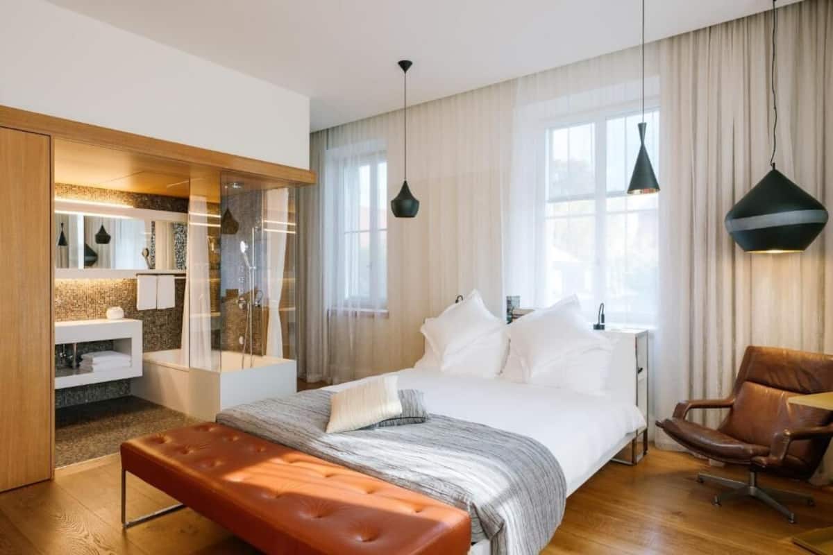 Junior Suite, City View | Minibar, in-room safe, desk, laptop workspace