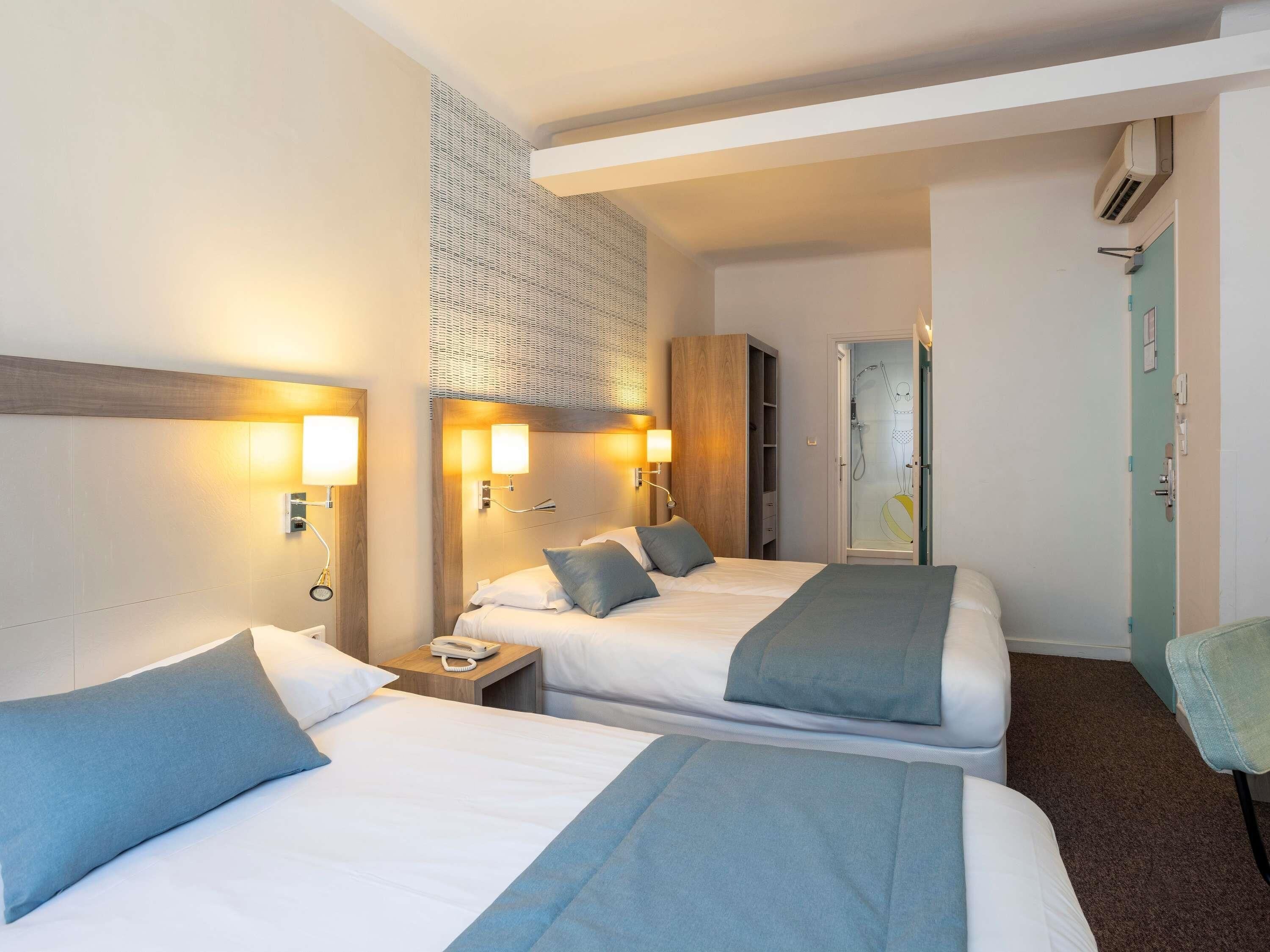 family suite, multiple beds (standard) | premium bedding, soundproofing, iron/ironing board