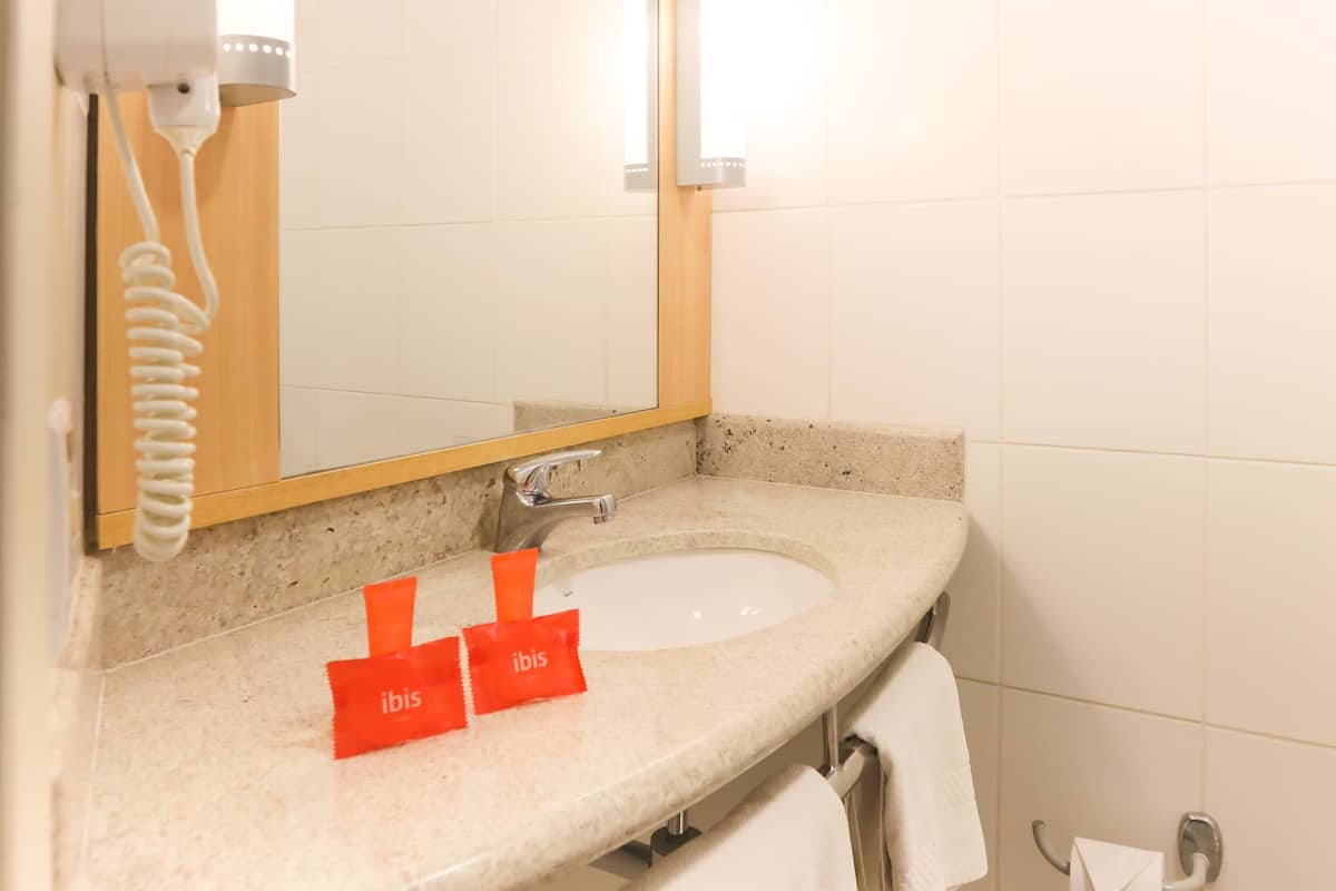 shower, eco-friendly toiletries, hair dryer, towels