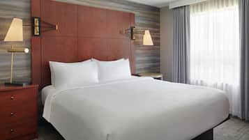 Down duvets, pillow-top beds, in-room safe, desk