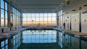 Indoor pool, open 7:00 AM to 10:00 PM, pool loungers