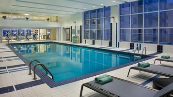 Indoor pool, open 7:00 AM to 10:00 PM, pool loungers