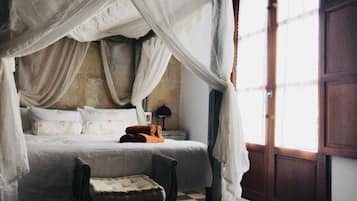 Suite | Down comforters, Select Comfort beds, in-room safe