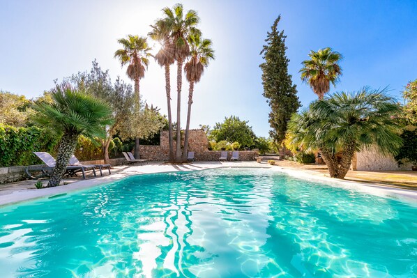 Seasonal outdoor pool, pool umbrellas, sun loungers