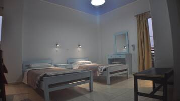 Premium bedding, blackout drapes, iron/ironing board, bed sheets