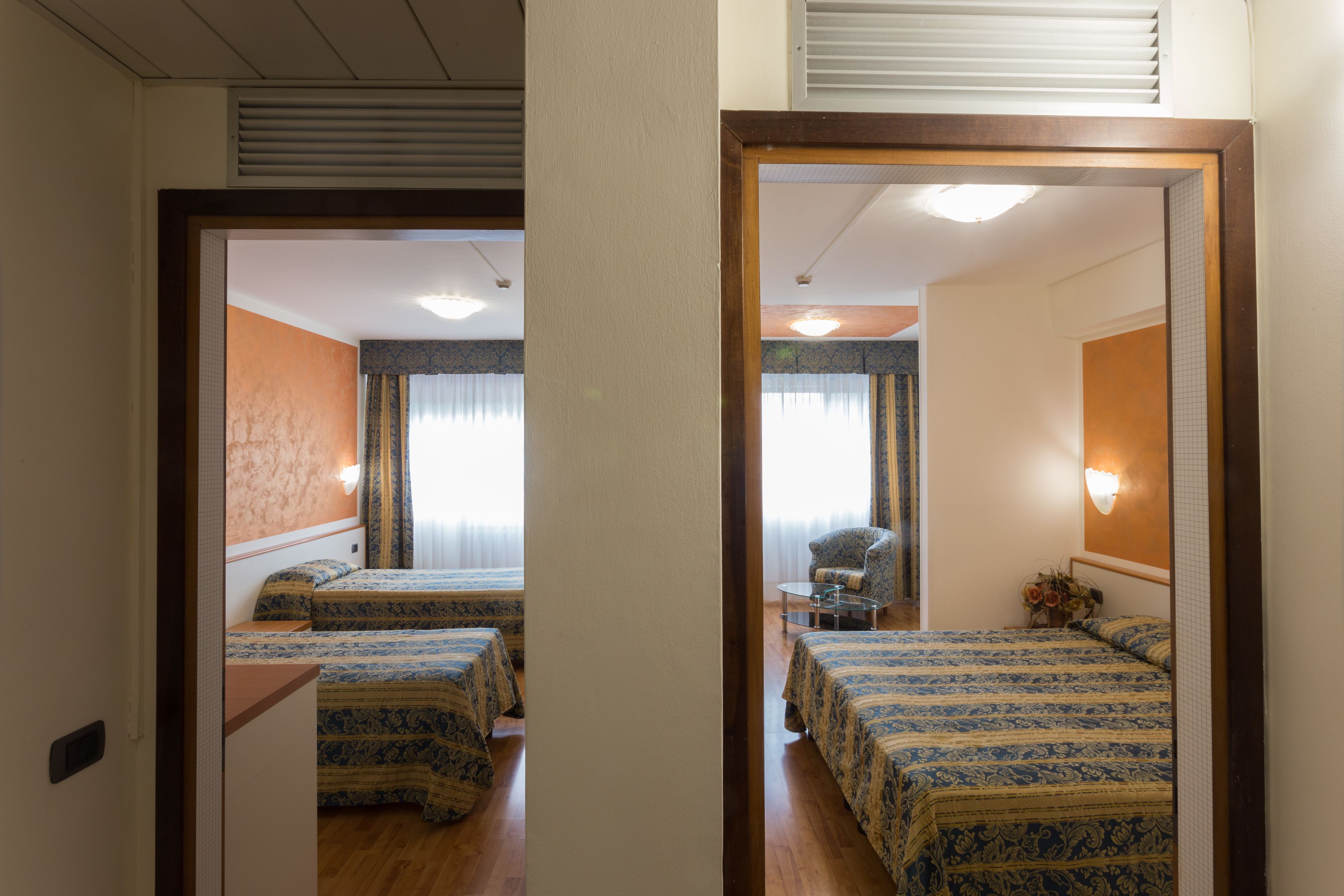 family room, 2 bedrooms | in-room safe, desk, laptop workspace, blackout curtains