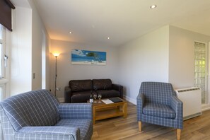 En 40-tommers Flatskjerm-TV med digitale kanaler samt TV