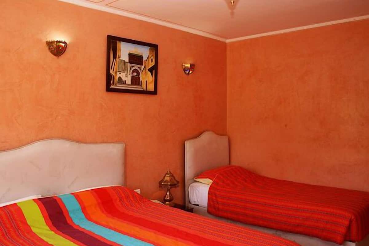 Habitación triple, vistas al jardín | Vistas al jardín