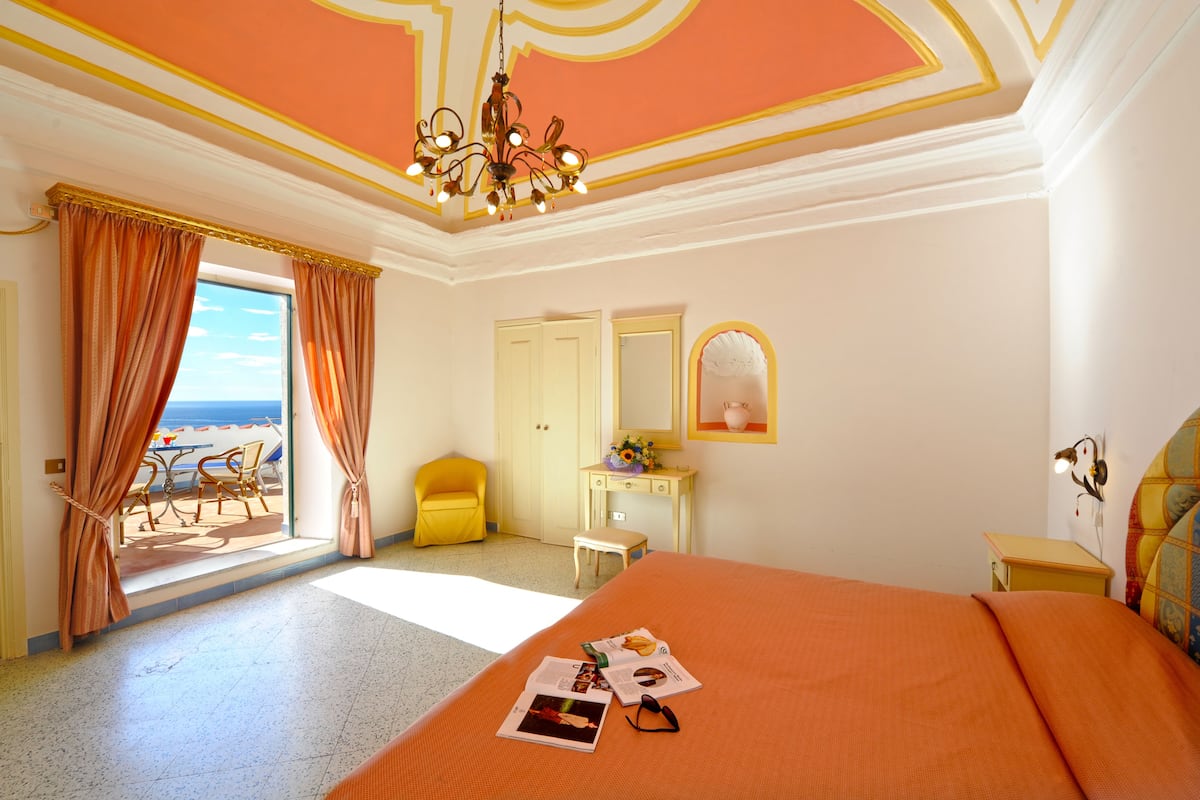 superior double room, balcony, sea view | minibar, in-room safe, desk, blackout curtains