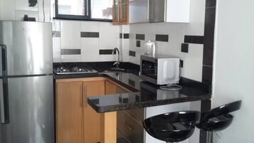 Suite estudio | Minibar, escritorio y wifi gratis