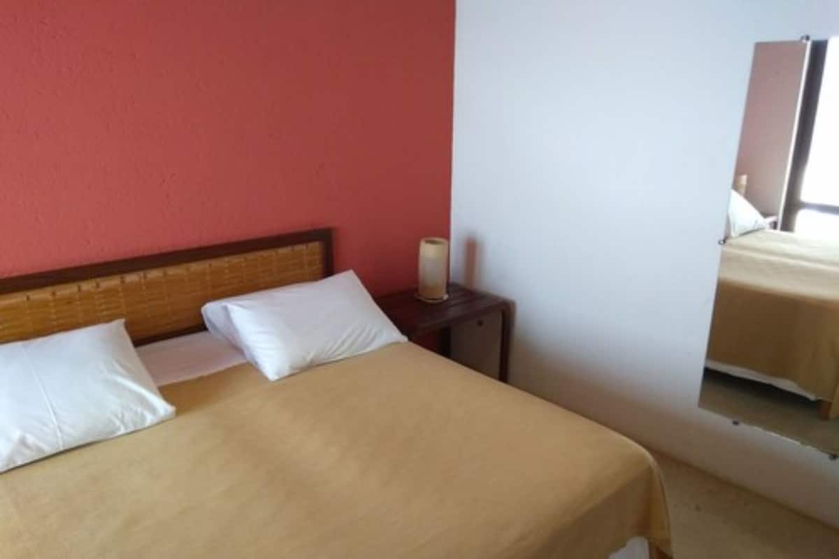 Apartment, 2 Schlafzimmer, eingeschränkter Meerblick | Verdunkelungsvorhänge, kostenloses WLAN, Bettwäsche