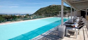 Indoor pool, 2 outdoor pools, pool umbrellas, sun loungers