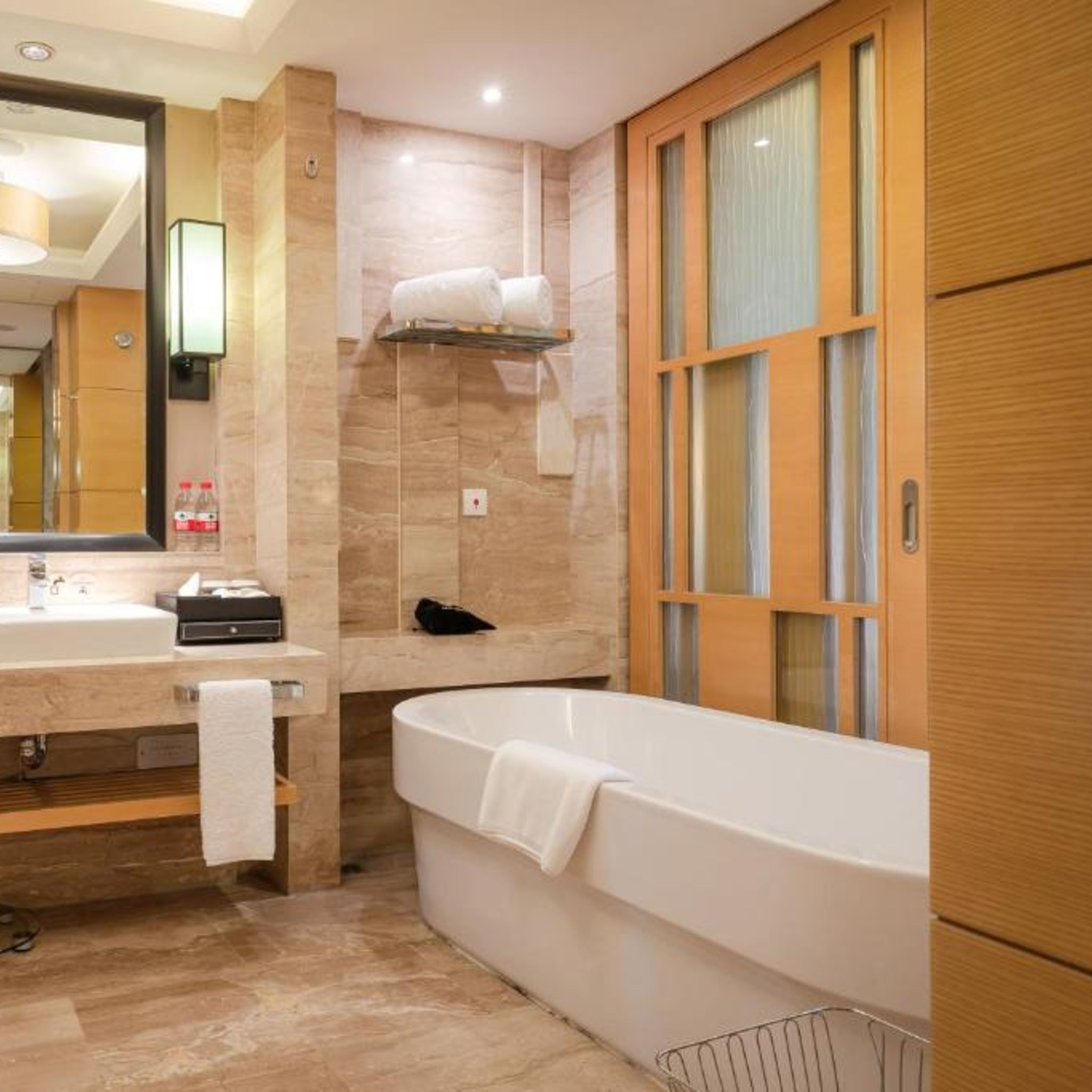 separate bathtub and shower, deep-soaking bathtub, rainfall showerhead