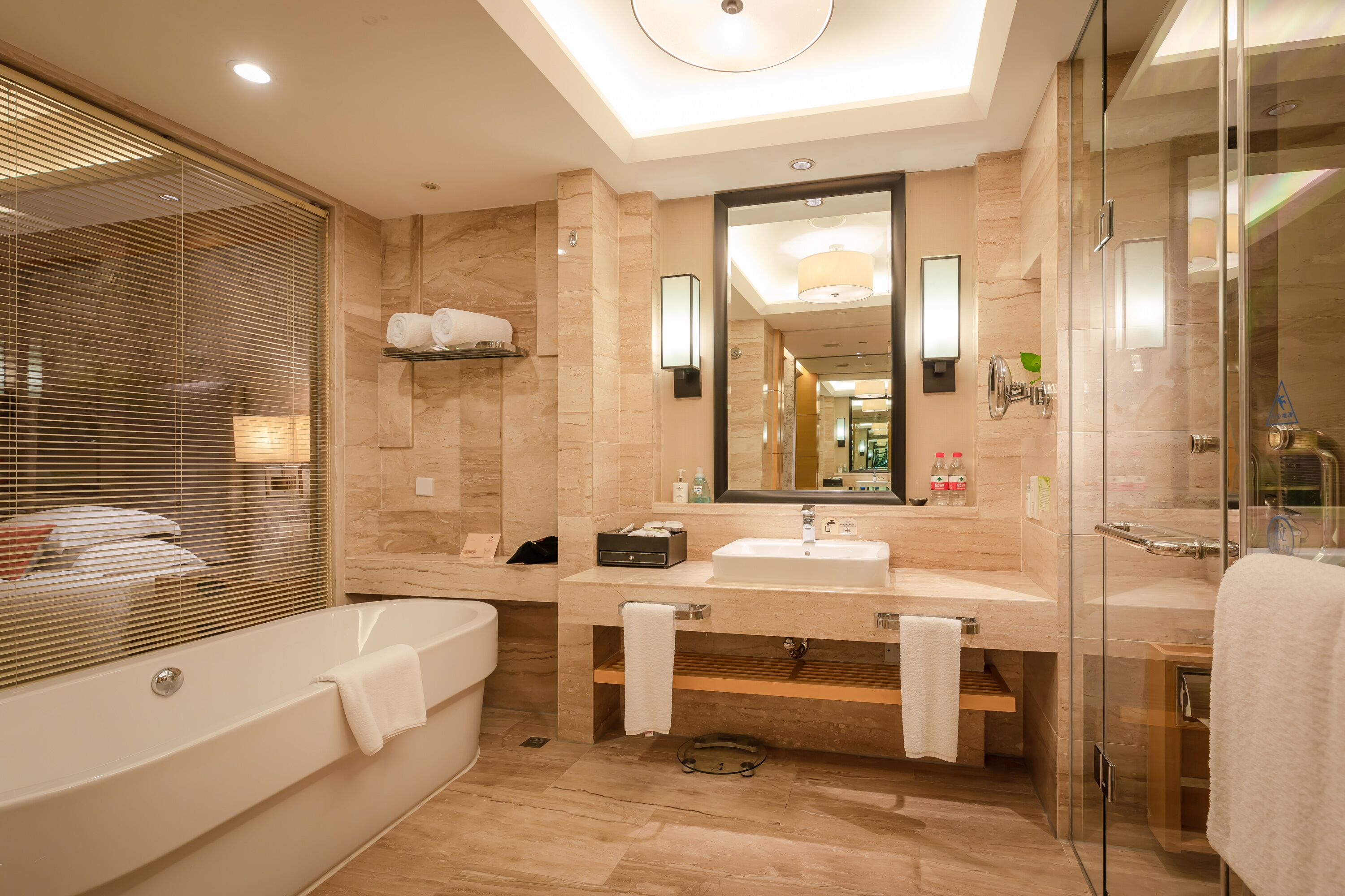 business suite | bathroom | separate bathtub and shower, deep-soaking bathtub, rainfall showerhead