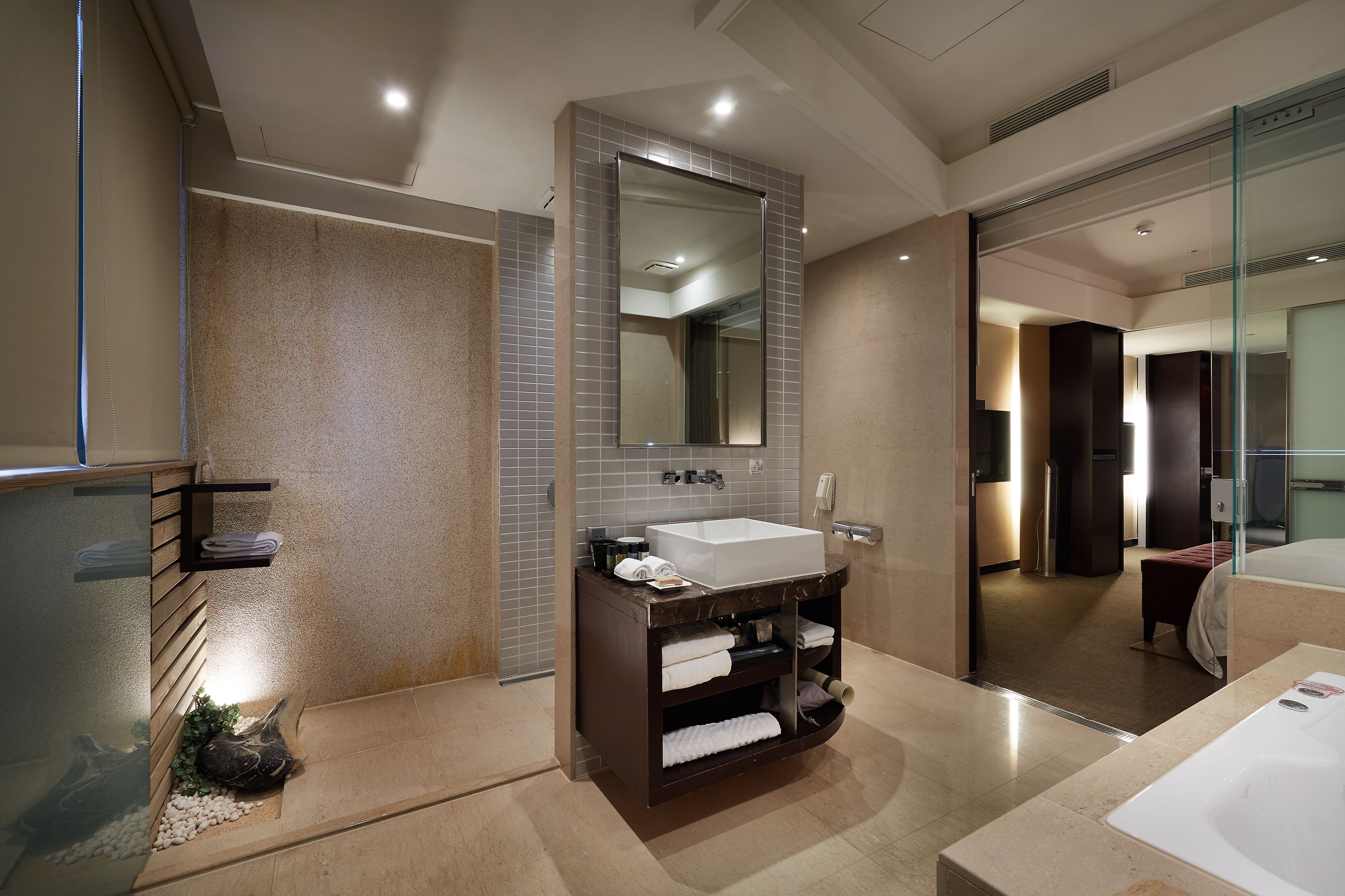 junior suite | bathroom | shower, rainfall showerhead, eco-friendly toiletries, hair dryer