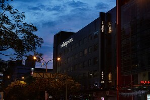A building with "The Tangor Hotel" signage, multiple windows, and a visible entrance. - The Tango Taipei XinYi (Taipei)