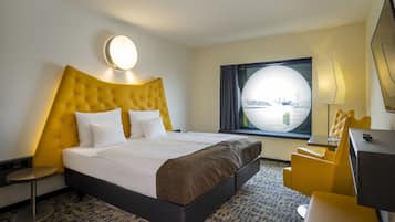 Premium bedding, down duvets, pillow-top beds, in-room safe