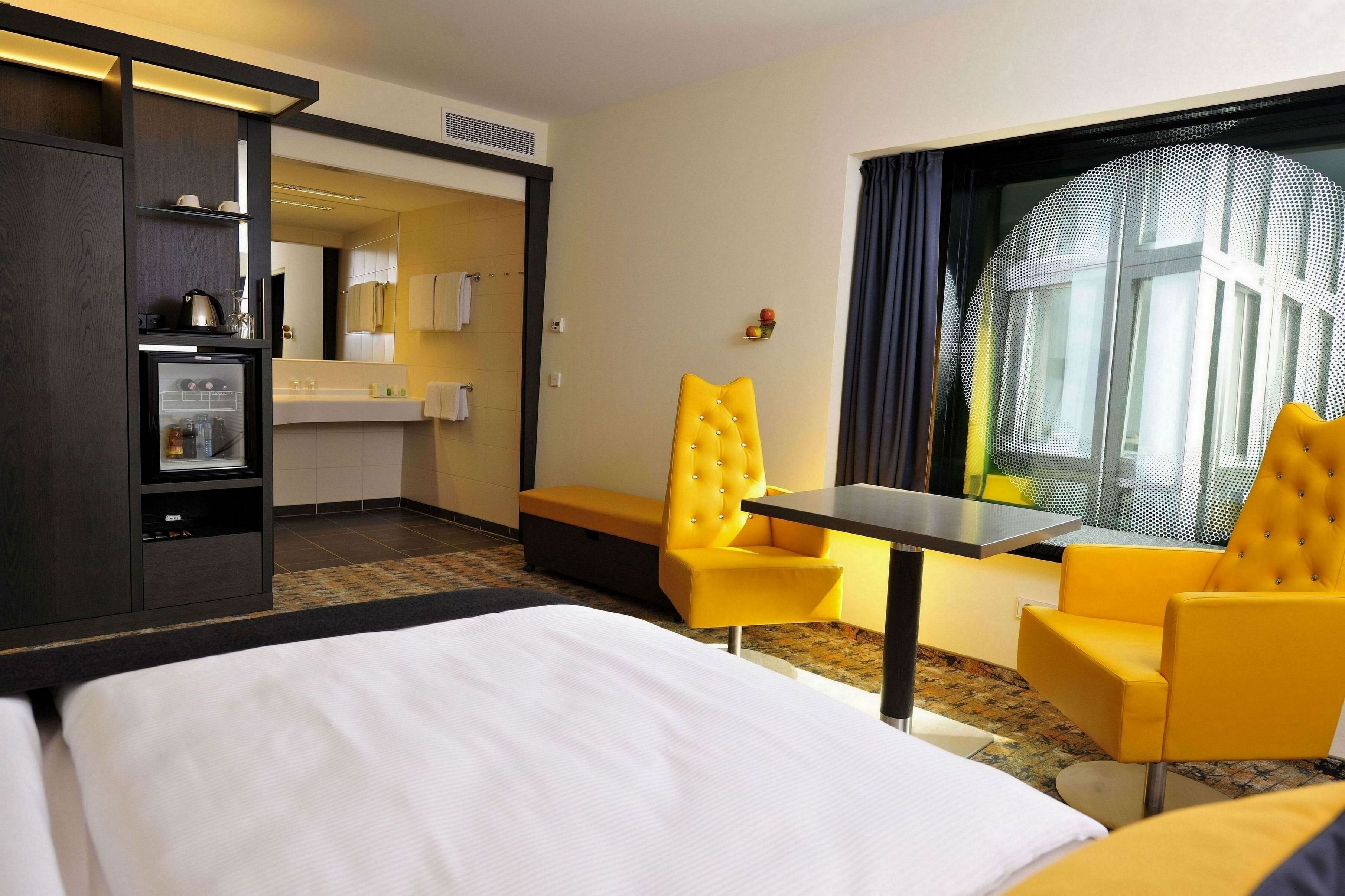 premium bedding, down duvets, pillow-top beds, in-room safe