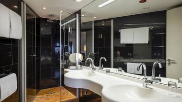 Suite | Premium bedding, down comforters, pillowtop beds, in-room safe