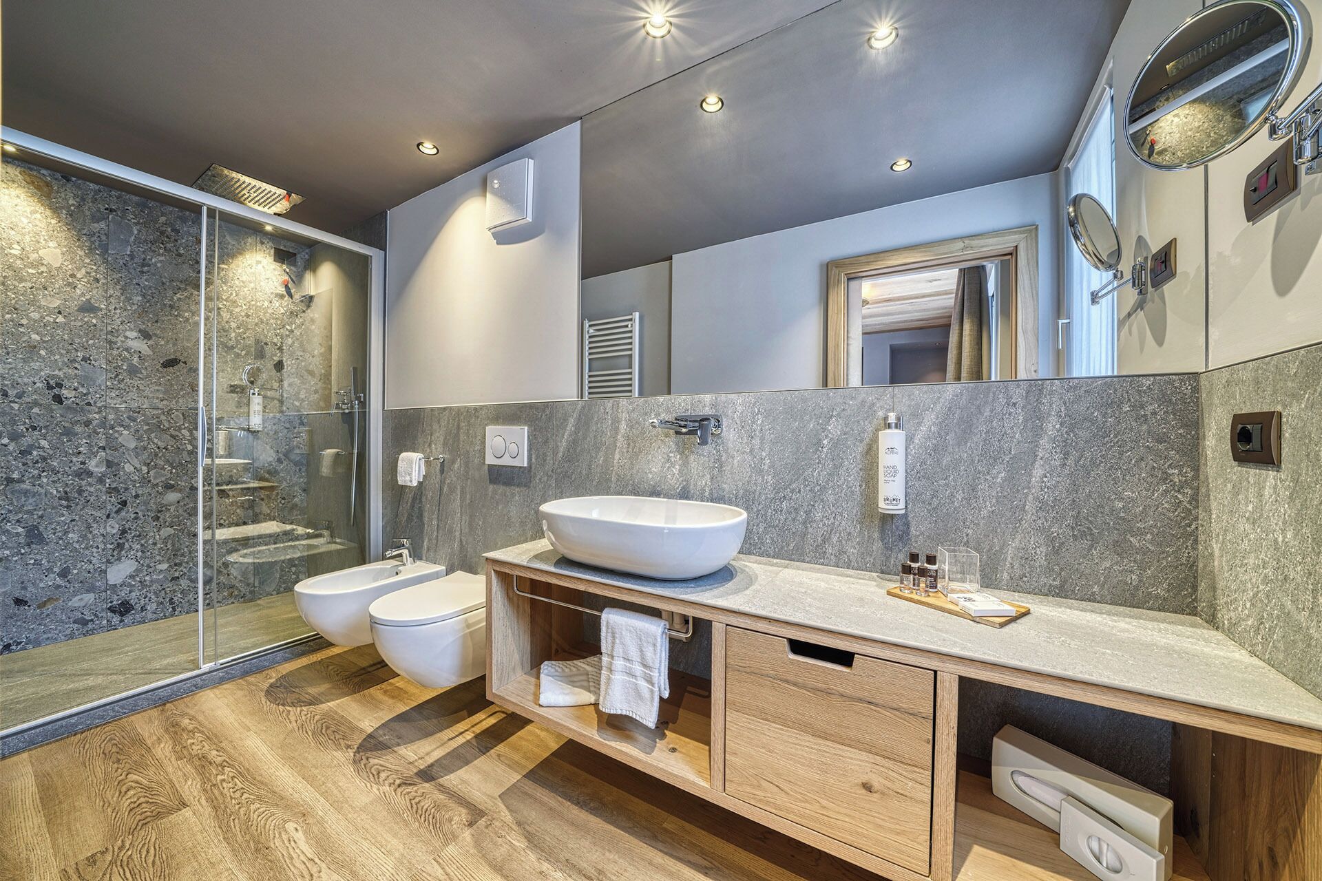 junior double room | bathroom | shower, rainfall showerhead, free toiletries, hair dryer