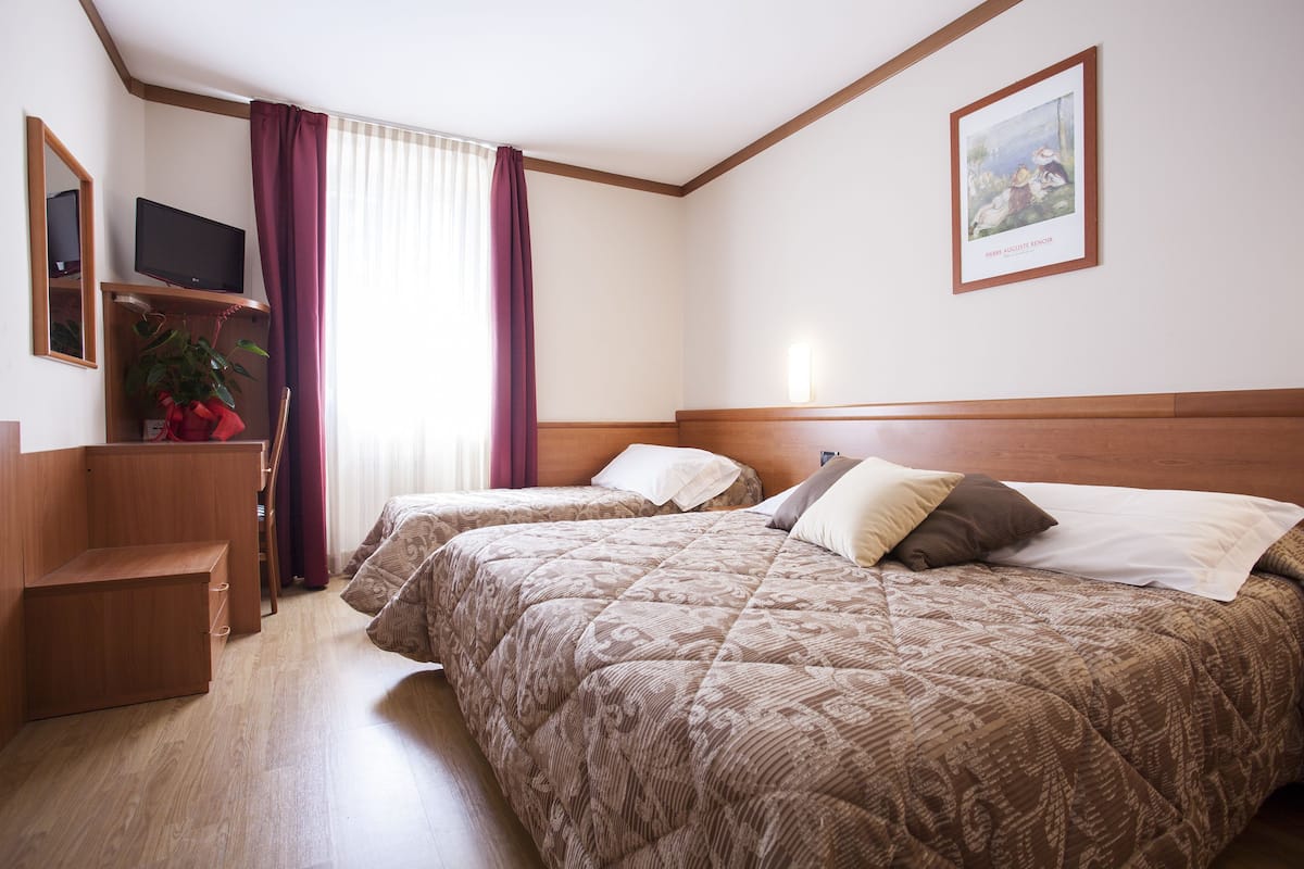 Standard Triple Room | Frette Italian sheets, Select Comfort beds, in-room safe, desk