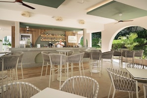 A bar area with a bartender, bar counter, and seating with tables and chairs. - Hotel Riu Palace Peninsula - All Inclusive (Cancun)
